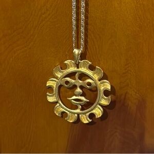 Gold Sunburst Necklace with Aztec Design